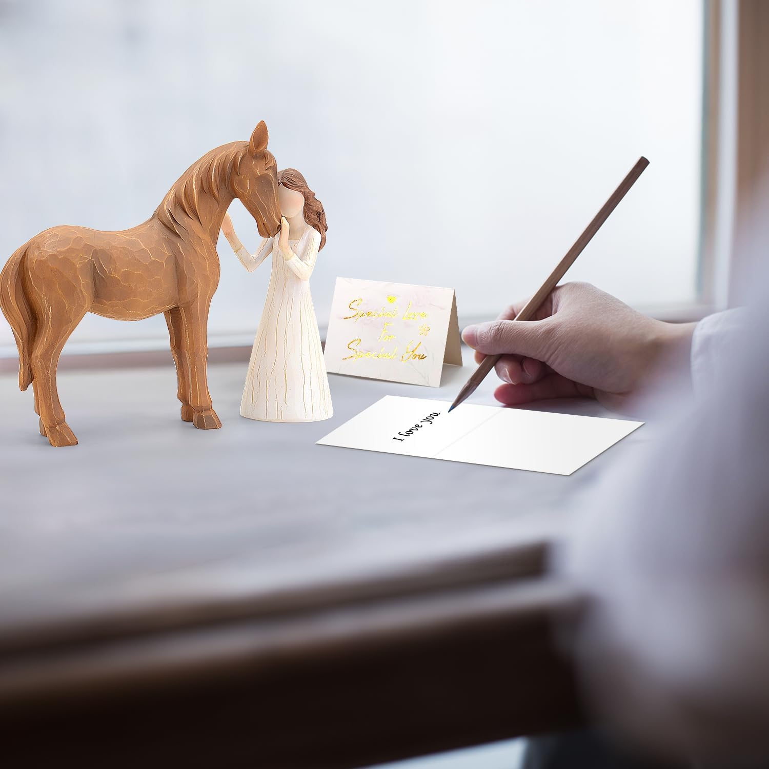 Horse and Girl Figurine Statue with Gift card on table