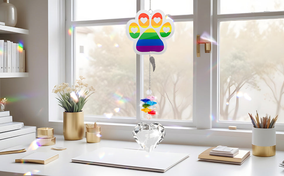 suncatcher acrylic rainbow paw clear heart-shaped pendant hang on the table under the sunshine