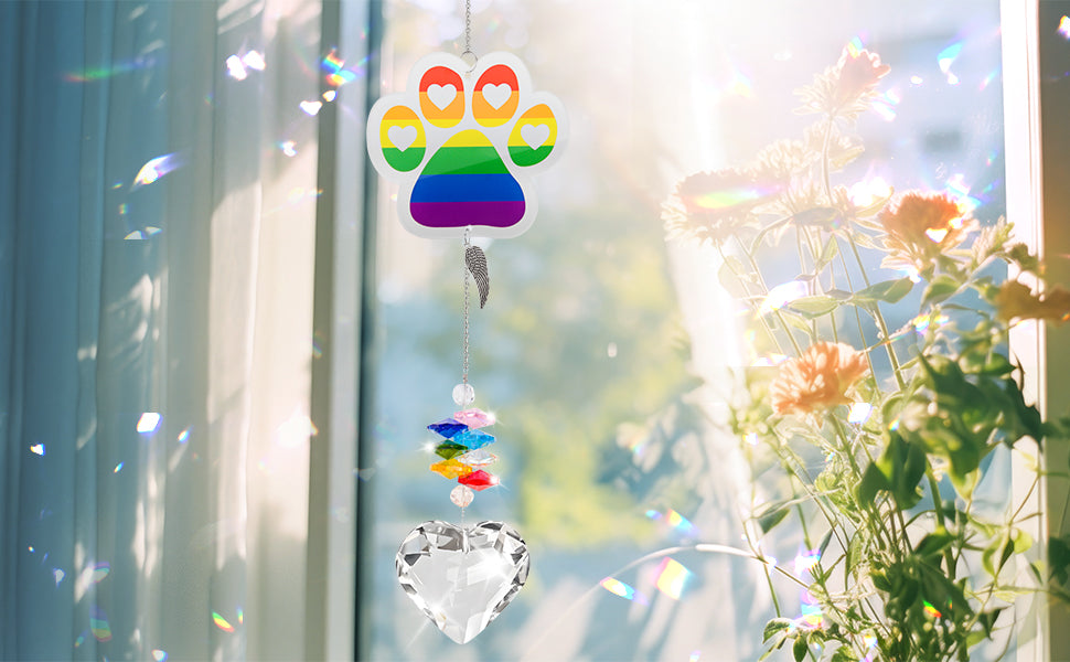 suncatcher acrylic rainbow paw clear heart-shaped pendant hang on the windowsill under the sunshine