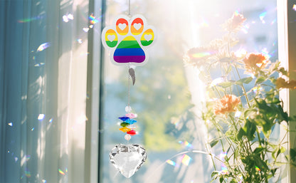 suncatcher acrylic rainbow paw clear heart-shaped pendant hang on the windowsill under the sunshine