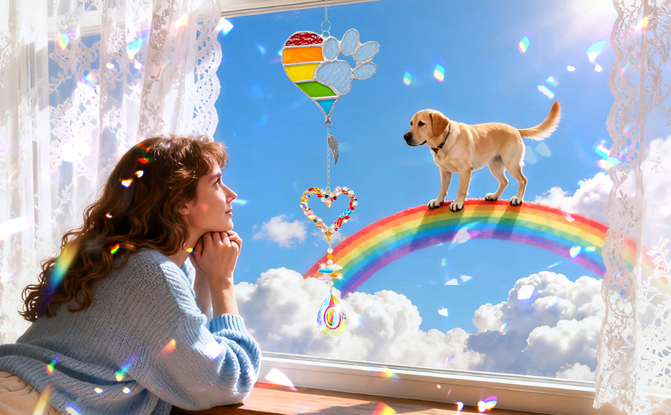 suncatcher metal rainbow paw and  heart-shaped rainbow pendant and teardrop crystal pendant girl dog on rainbow bridge on the windowsill