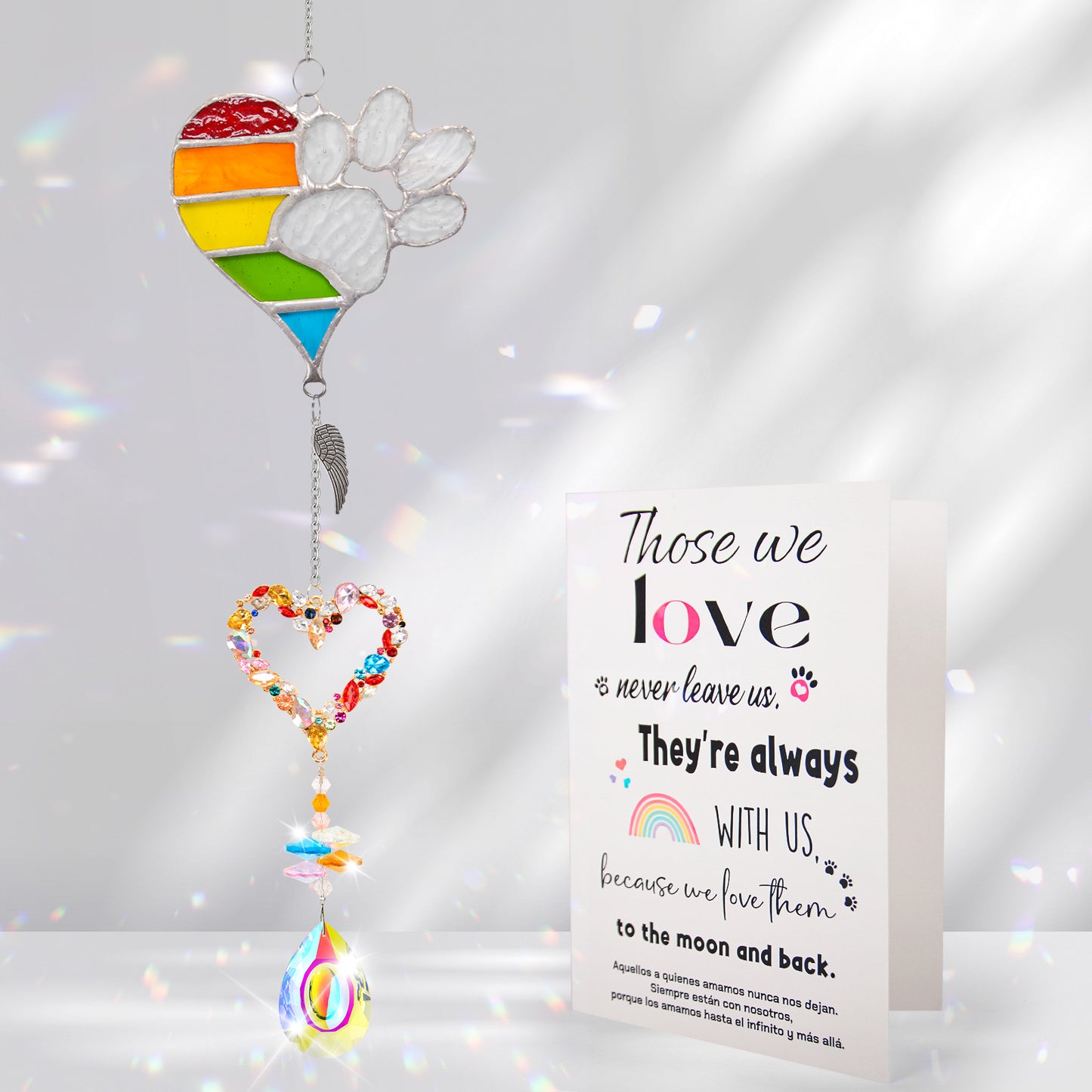 suncatcher metal rainbow paw and  heart-shaped rainbow pendant and teardrop crystal pendant with sympathy card
